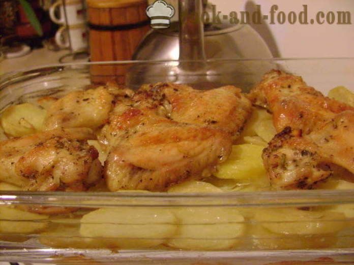 Piščančje perutničke na posteljici iz krompirja v pečici - kako bi krila in krompir v pečici, s korak za korakom receptov fotografije